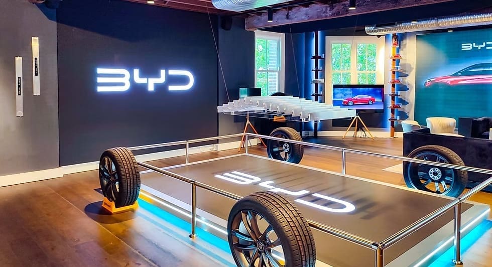 BYD automotive showroom with branded LED display highlighting the company’s EV technology.